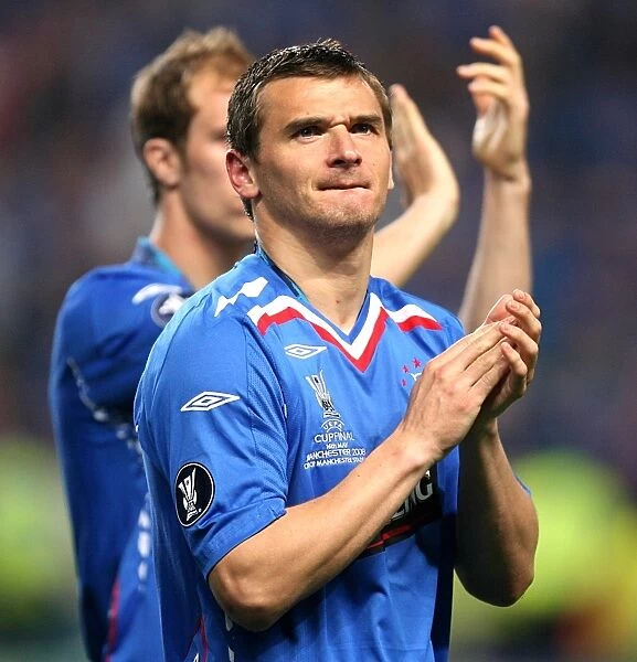 Rangers Football Club: Lee McCulloch Celebrates UEFA Cup Victory and Applauds Manchester Stadium Fans (2008)