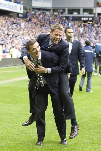 Rangers Football Club: Lee McCulloch and James Beattie's Embrace of Champions League and SPL Victory (2010-11)