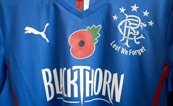 Rangers Football Club: Lest We Forget - Remembrance Day Tribute in SPFL League 1: Rangers vs Airdrieonians at Ibrox Stadium (Scottish Cup Winners 2003) - Poppies and LEST WE FORGET on Home Shirts