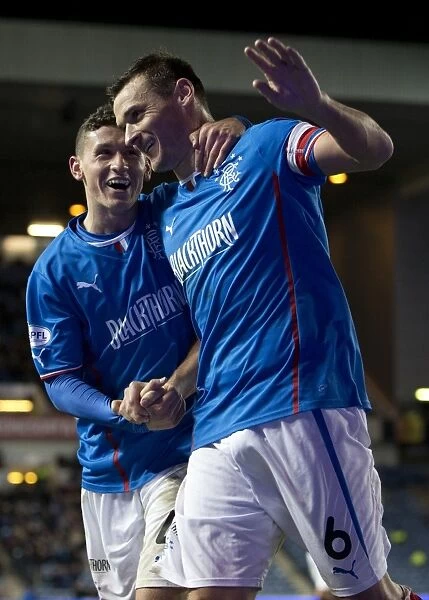 Rangers Football Club: McCulloch and Aird's Euphoric Moment as They Celebrate Goal at Ibrox Stadium (Scottish League One: Rangers vs Forfar Athletic)