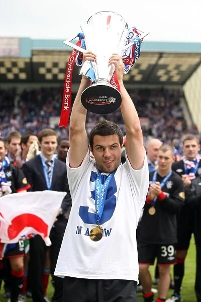 Rangers Football Club: Richard Foster's Triumphant Moment - Celebrating SPL Championship Win at Rugby Park (2010-2011)