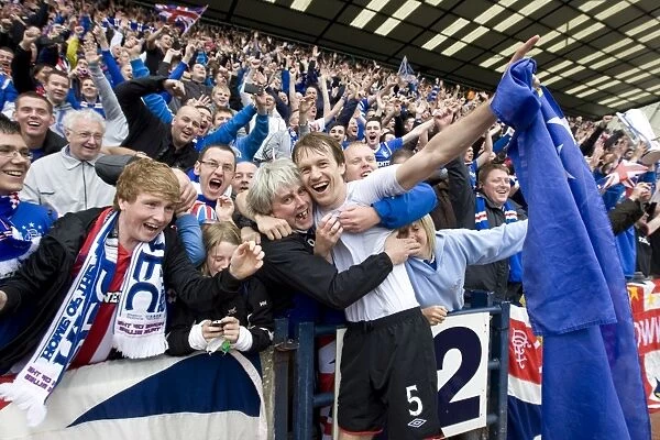 Rangers Football Club: Sasa Papac and Ecstatic Fans Celebrate 2010-11 Clydesdale Bank Scottish Premier League Championship Win at Rugby Park