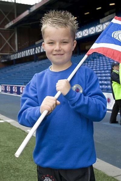 Rangers Football Club: SPL Champions Greeted by Thrilled Kids during Motherwell Match (SPL Champions Parade)