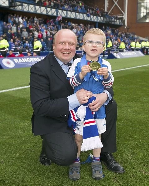 Rangers Football Club: Steve Harvey and Son Rejoice in Ladbrokes Championship Victory at Ibrox Stadium