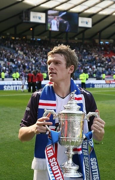 Rangers Football Club: Steven Davis Celebrates Scottish Cup Victory (2008) - Triumphing with the Trophy at Hampden Park