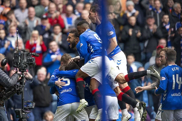 Rangers Football Club: Tavernier's Double Strike and the Triumphant Moment with Team Mates in Scottish Premiership at Ibrox Stadium