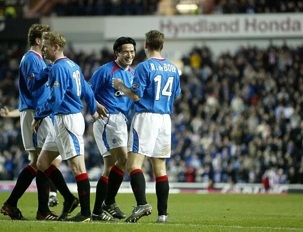 Rangers Football Club: Triumphant Moment - De Boer, Mols, Ball, and Hutton's Euphoric Celebration (23 / 03 / 04)