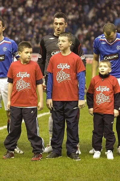 Rangers Football Club's Cash for Kids Mascot Celebrates 2-1 Victory over Hearts in Clydesdale Bank Premier League Battle at Ibrox