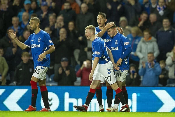 Rangers Glenn Middleton Doubles Up: Celebrating with Nikola Katic and Stephen Kelly in the Betfred Cup Quarterfinal at Ibrox Stadium