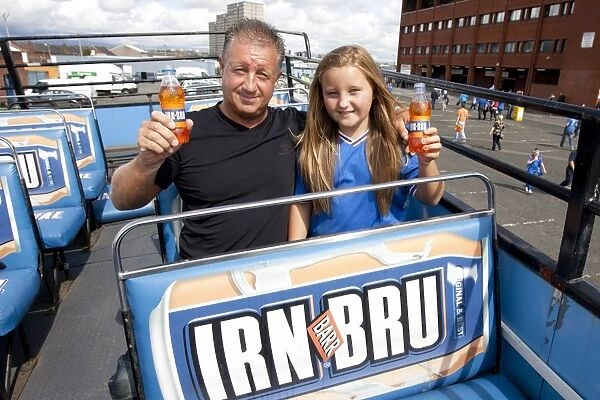 Rangers Glory: Billy and Morgan Lindsay's Jubilant Moment on the Irn Bru Bus after a 5-1 Victory