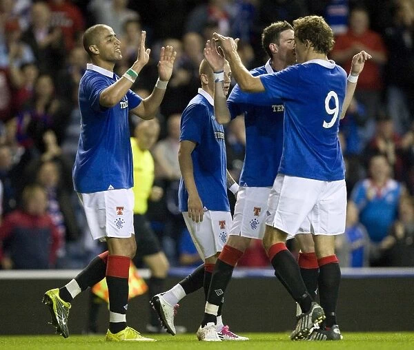 Rangers Glory: Majid Bougherra and Teammates Seven-Goal Triumph over Dunfermline in CIS Insurance Cup