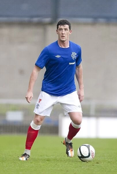 Rangers Glory: Ross Perry Scores the Decisive Goal (2-0) Against Linfield at Windsor Park