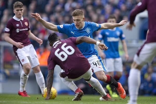 Rangers Greg Docherty in Action: Scottish Premiership Showdown against 2003 Scottish Cup Champions Heart of Midlothian at Ibrox