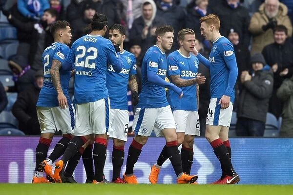 Rangers Jason Cummings Scores and Celebrates First Goal with Team Mates in Scottish Cup Quarterfinal at Ibrox Stadium