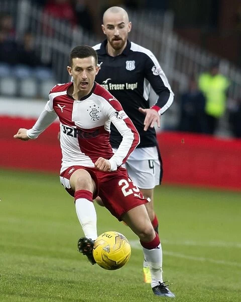 Rangers Jason Holt in Action at Dens Park: A Battle in the Ladbrokes Premiership