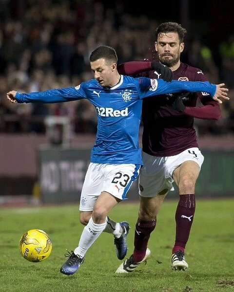 Rangers Jason Holt Protects the Ball from Hearts Alexandros Tziolis at Tynecastle Stadium