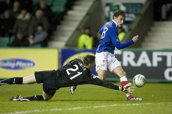 Rangers Jelavic Scores Stunning Second Goal Past Hibernian's Smith in Scottish Premier League