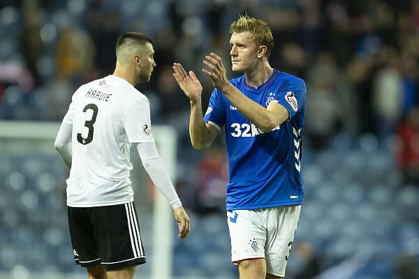 Rangers Joe Worrall Celebrates Betfred Cup Quarterfinal Victory with Ibrox Fans