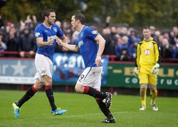 Rangers Jon Daly and Andy Little: Celebrating Goals in Thrilling 3-4 Victory over Brechin City (SPFL League 1)