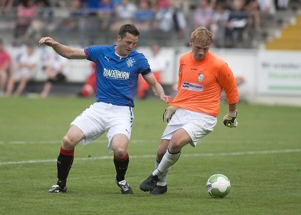 Rangers Jon Daly Attempts to Score Past FC Gutersloh Keeper: 0-1 Pre-Season Friendly Thriller