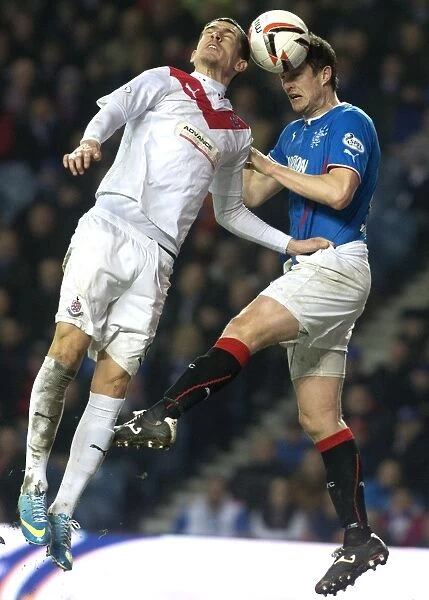 Rangers Jon Daly Fights for Supremacy in the Air: Airdrieonians vs Rangers at Ibrox Stadium, Scottish League One