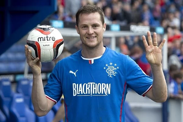 Rangers Jon Daly: Rejoicing with Pride and the Historic Match Ball after Rangers 8-0 Victory over Stenhousemuir at Ibrox Stadium