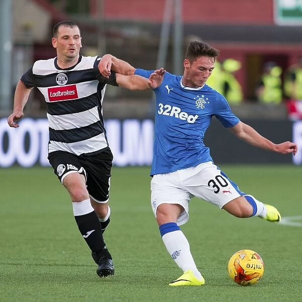 Rangers Jordan Thompson Unleashes a Powerful Shot in Betfred Cup Match against East Stirlingshire