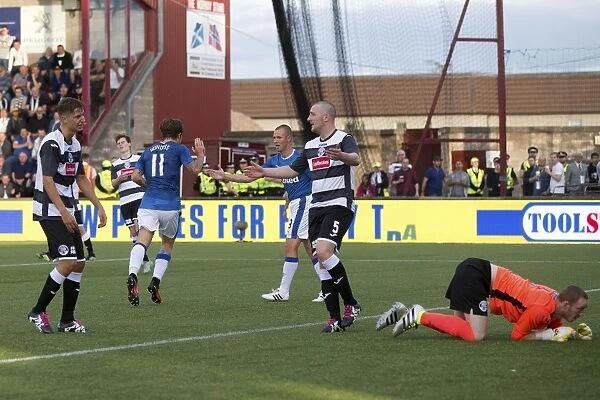 Rangers Josh Windass: Celebrating Glory in Betfred Cup Victory over East Stirlingshire at Ochilview Park