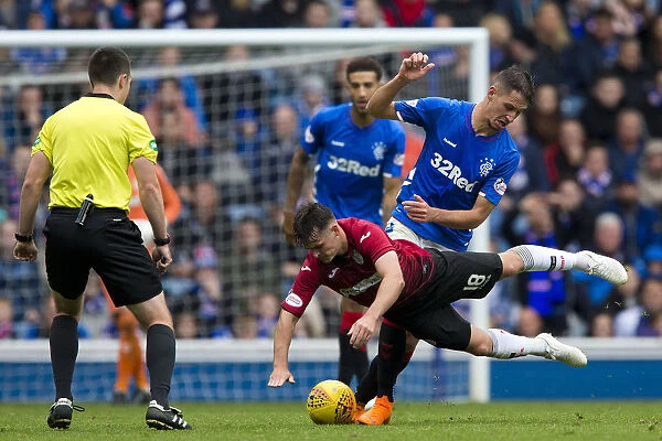 Rangers Katic Holds Off Mullen: Intense Moment at Ibrox Stadium