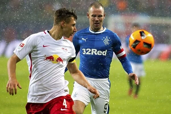 Rangers Kenny Miller Chases Down Willi Orban at Red Bull Arena: A Glimpse of the Intensity in RB Leipzig vs Rangers Friendly