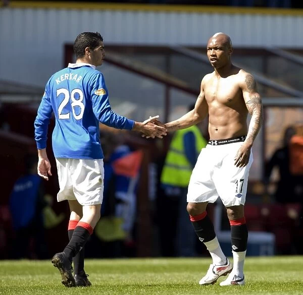 Rangers Kerkar and Diouf: Celebrating a 5-0 Victory Over Motherwell
