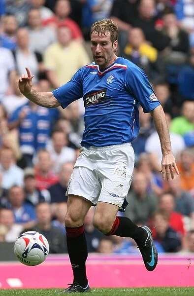 Rangers Kirk Broadfoot Celebrates Glory: 3-1 Victory Over Dundee United in Clydesdale Bank Premier League