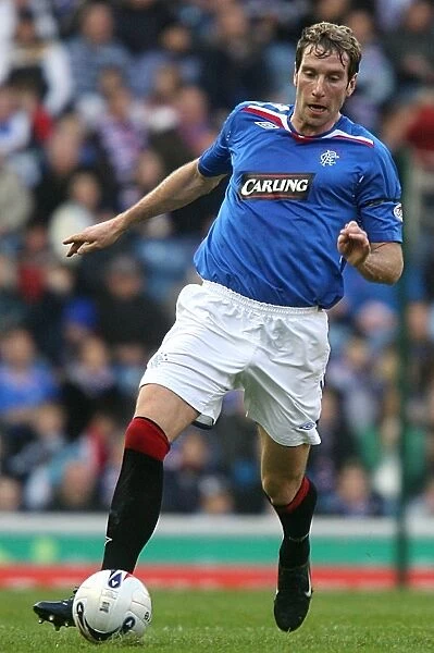 Rangers Kirk Broadfoot Celebrates Glory: 2-0 Win Over Falkirk in Clydesdale Bank Premier League
