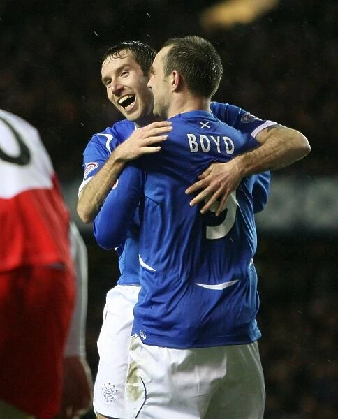 Rangers Kirk Broadfoot and Kris Boyd: Celebrating a 3-1 Victory Over Falkirk
