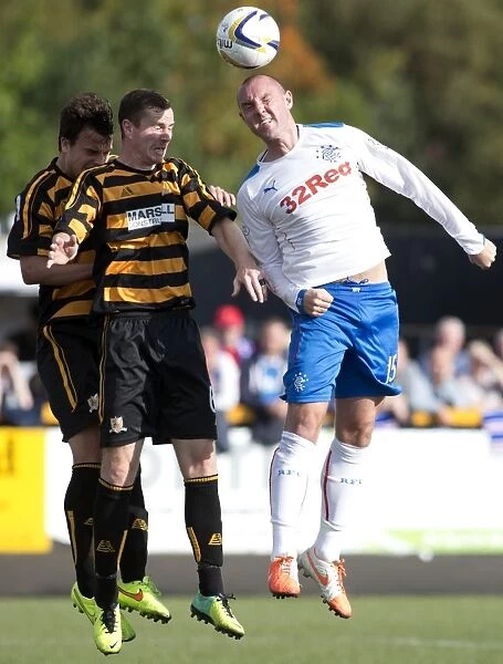 Rangers Kris Boyd Fights for a Header Against Alloa Athletic in the SPFL Championship