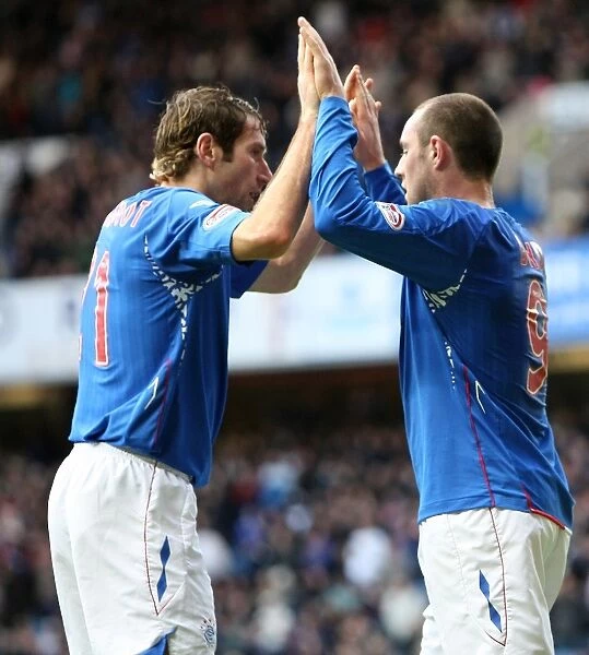 Rangers Kris Boyd and Kirk Broadfoot: Unstoppable Duo Celebrates Goal in Rangers 4-2 Victory over St. Mirren (Ibrox)