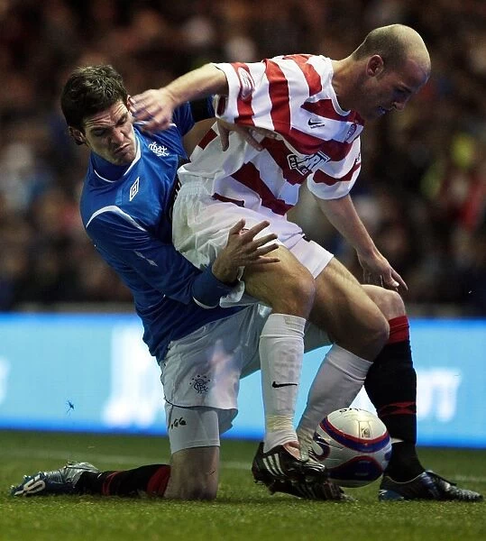 Rangers Kyle Lafferty Fends Off Hamilton's McClenahan in CIS Insurance Cup Quarter-Final at Ibrox (2-0)