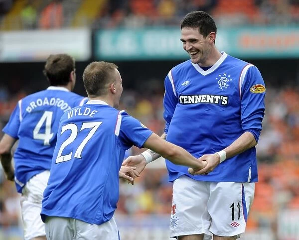 Rangers Kyle Lafferty and Gregg Wylde: Celebrating a 1-0 Victory Over Dundee United