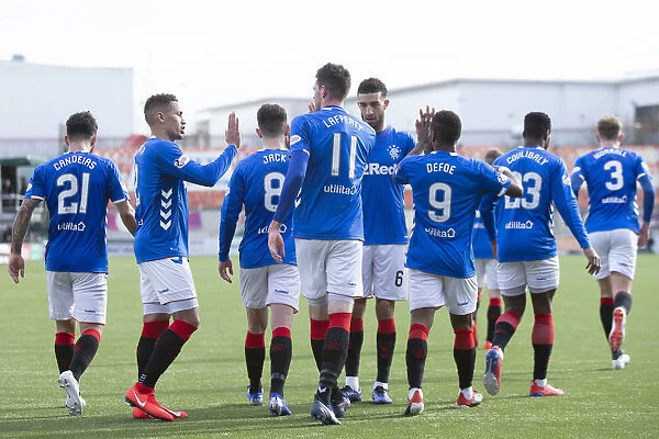 Rangers Kyle Lafferty and Teamsmates Celebrate Goal Victory at Hamilton's Hope Central Business District Stadium