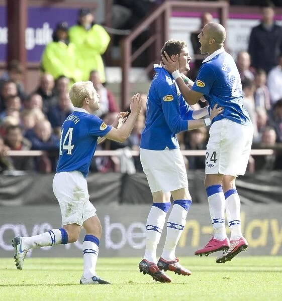 Rangers Lafferty and Bougherra: Celebrating Glory with a 2-1 SPL Win over Heart of Midlothian