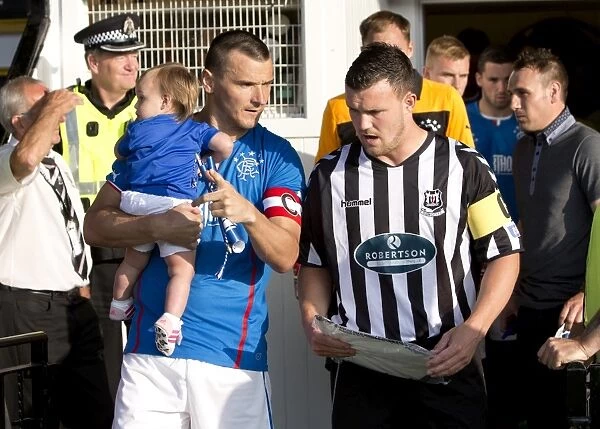 Rangers Lee McCulloch and Elgin City's David Niven: Leading Their Teams in Pre-Season Friendly (1-0 in Favor of Rangers)