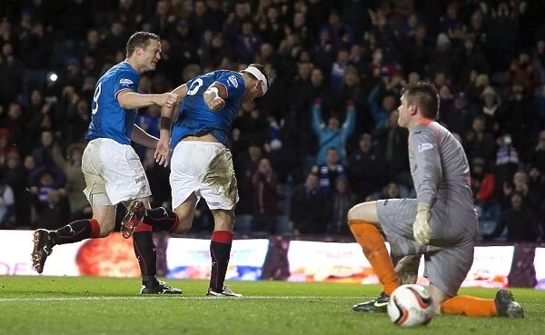 Rangers Lee McCulloch Scores Thrilling Penalty at Ibrox Stadium in SPFL League 1 Clash vs. Dunfermline Athletic