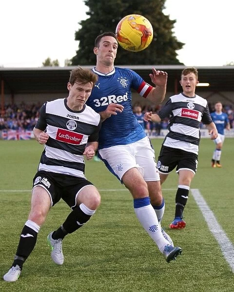 Rangers Lee Wallace Fights for Ball in Intense Betfred Cup Match at Ochilview Park