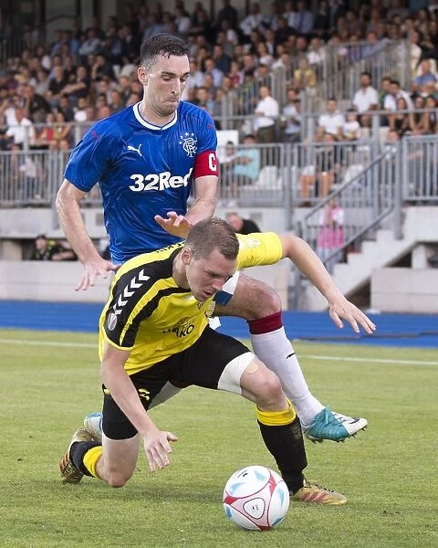 Rangers Lee Wallace Fights for Ball in Intense Europa League Clash vs FC Progres Niederkorn