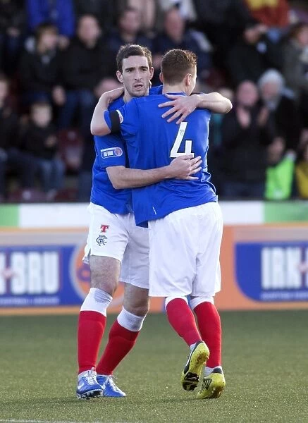 Rangers Lee Wallace and Lewis Macleod: A Celebratory Moment in Rangers 6-2 Victory over East Stirlingshire
