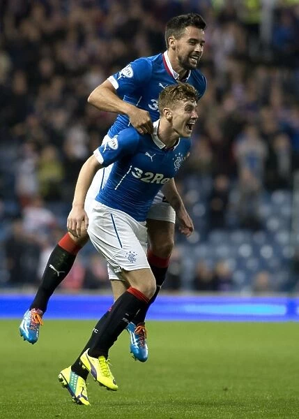 Rangers: Macleod and McGregor Celebrate Goal at Ibrox in Scottish League Cup Victory