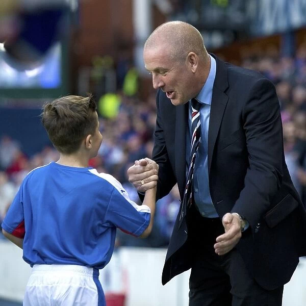 Rangers Manager Mark Warburton Greets Ibrox Stadium Mascots during Scottish League Cup Match