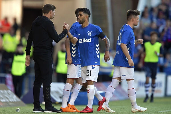 Rangers Manager Steven Gerrard in Deep Discussion with Daniel Candeias at Ibrox Stadium