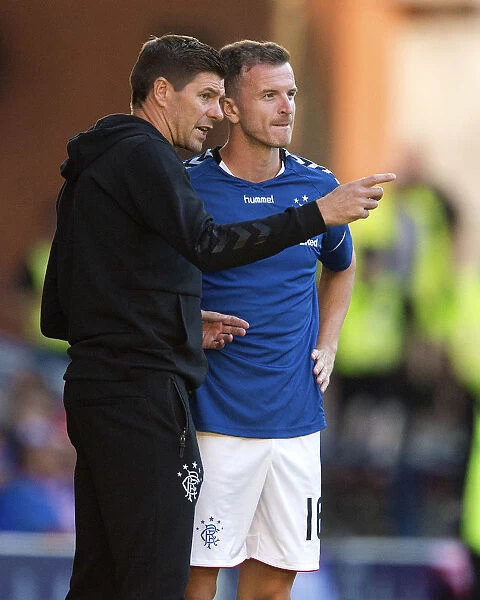 Rangers Manager Steven Gerrard Engages in Deep Discussion with Andy Halliday during Pre-Season Friendly at Ibrox Stadium