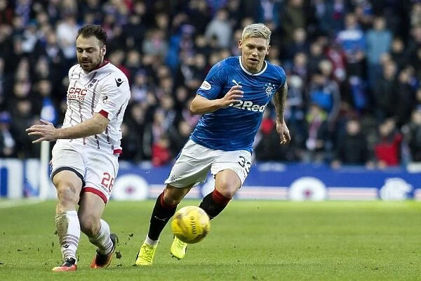Rangers Martyn Waghorn in Pursuit: Intense Action from the Ladbrokes Premiership Match vs Ross County at Ibrox Stadium